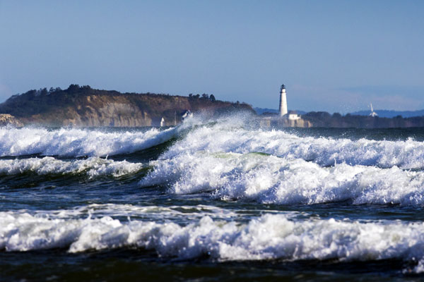 Photo of waves crashing on a New England coastline